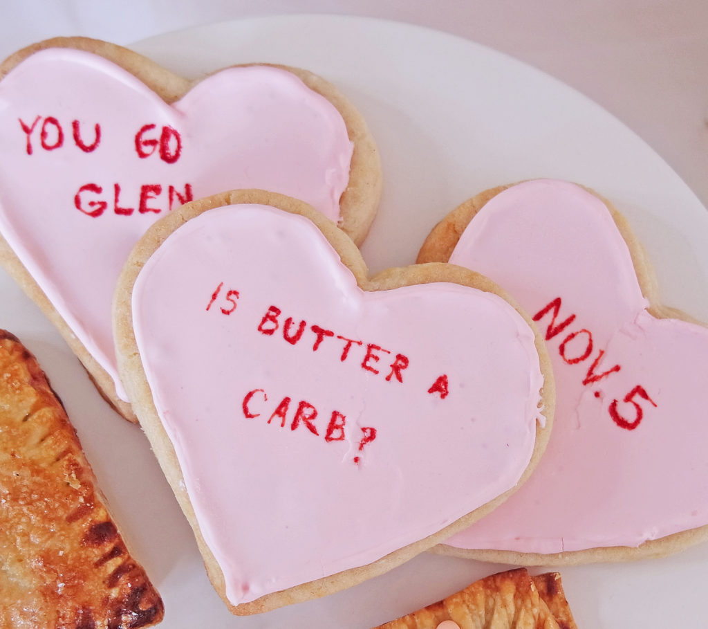 How to throw the best Galentine's Day brunch, conversation heart cookies